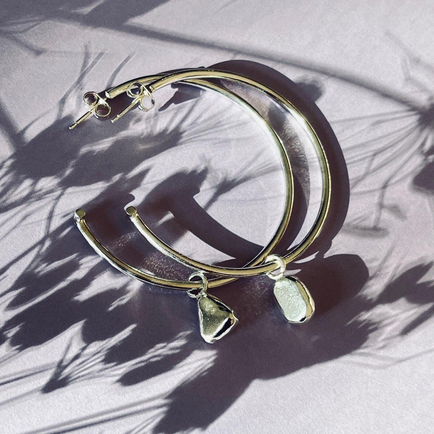 Silver mismatched charm hoops