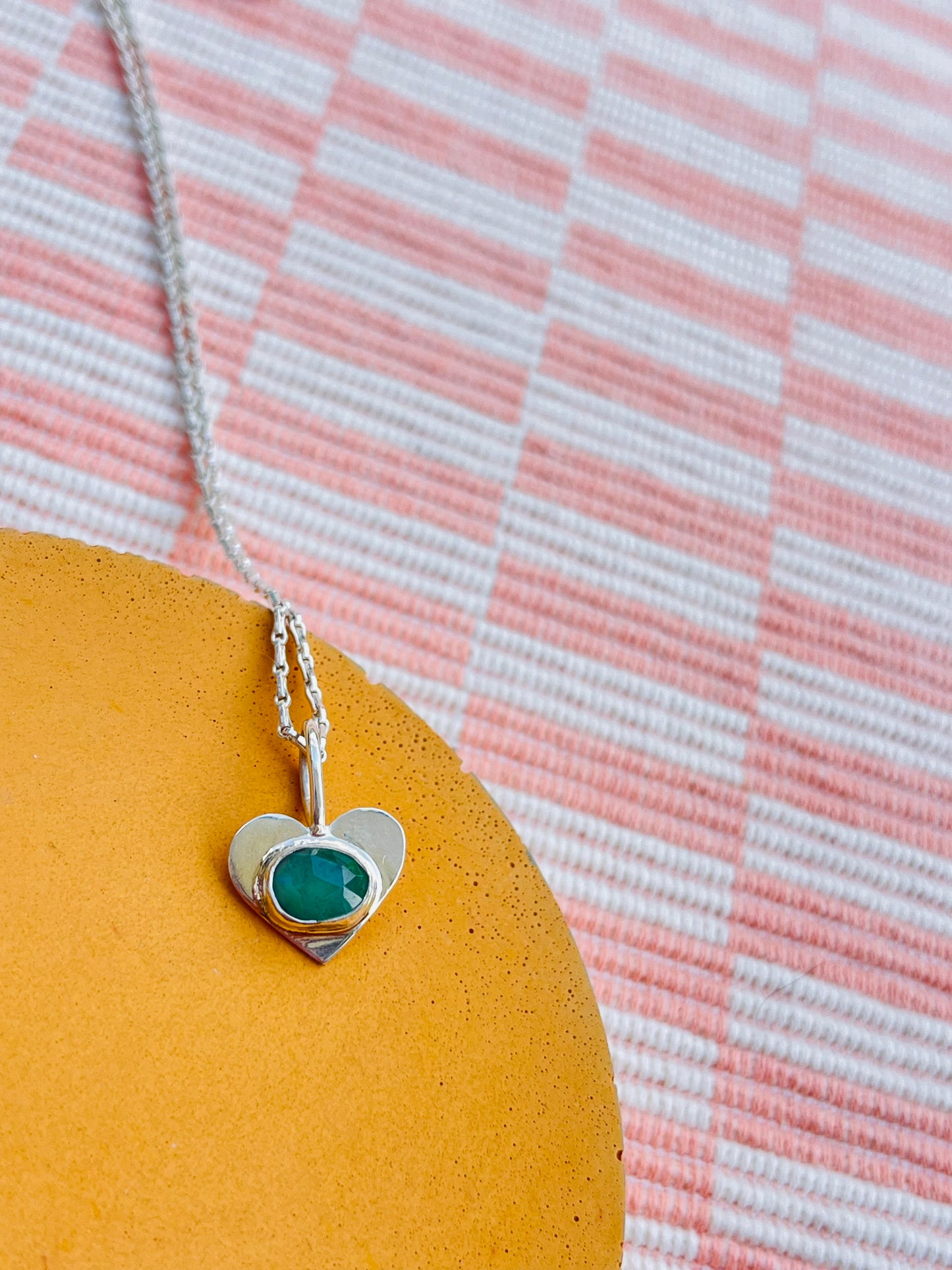 Emerald heart pendant