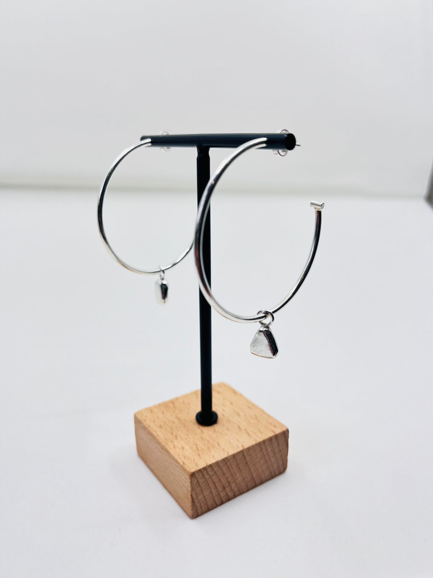 Silver mismatched charm hoops