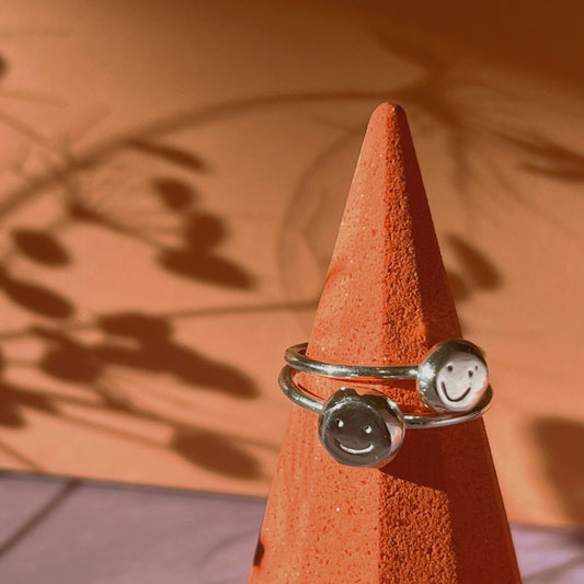 Silver smiley stacking rings