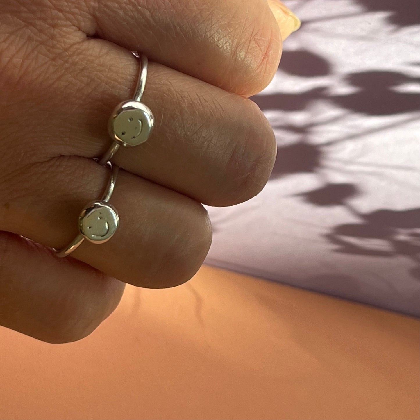 Silver smiley stacking rings