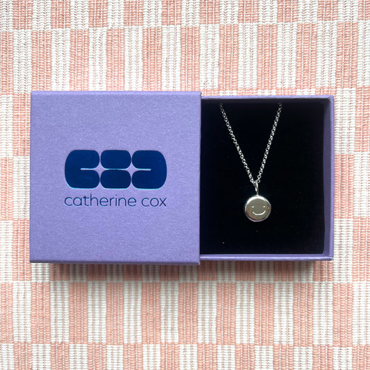Sterling silver smiley pendant