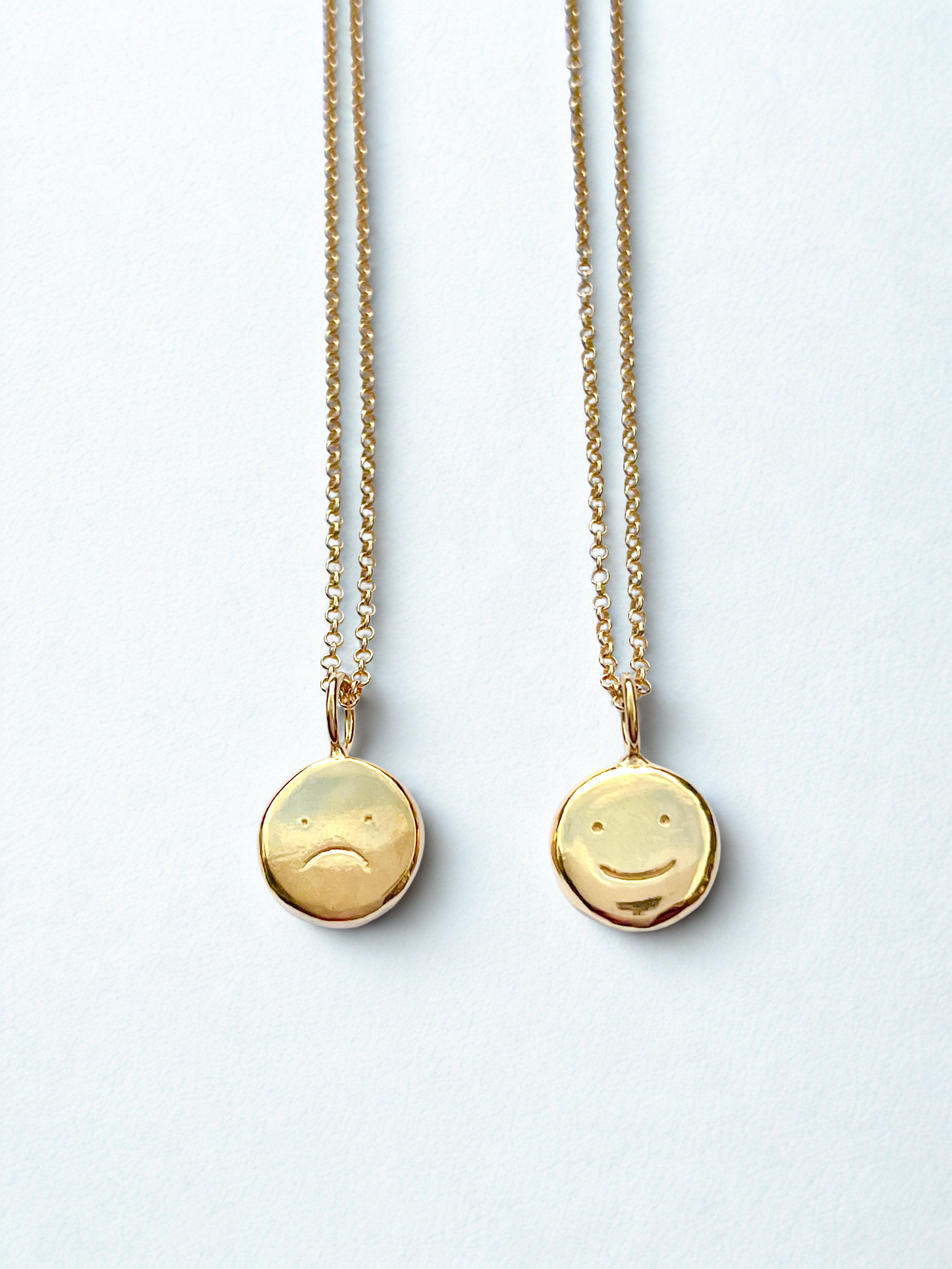 Gold vermeil “moodflip” smiley pendant